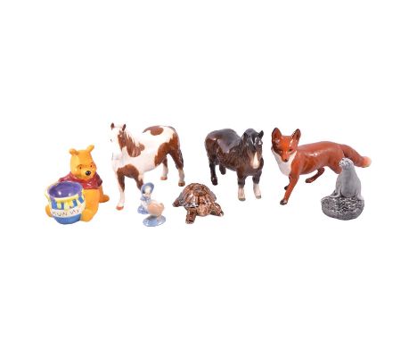 Beswick, Wade and other animal figurines including Beswick Pinto Pony Skewbald, Beswick Springer Spaniel, novelty Carlton War