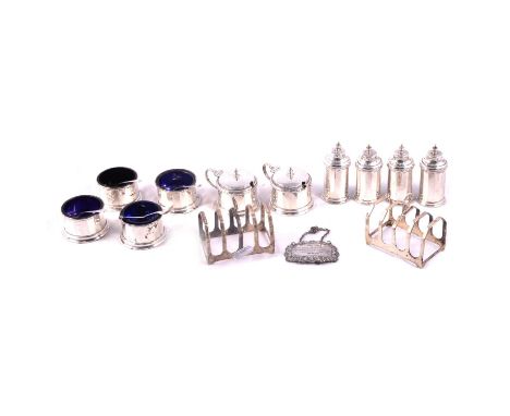 Pair of silver toast racks, Viner's Ltd., Sheffield 1929, silver double cruet, silver decanter label, total weighable silver 