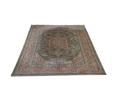 Persian design carpet, probably Belgian, machine made, central medallion on af stylised floral field within guards, broad scr