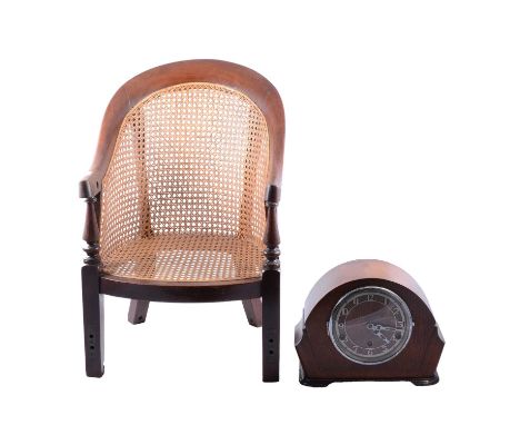Victorian mahogany child's chair, cane panelled, width 38cm, height 61cm, and a mantel clock.Qty: 2