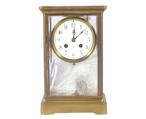 Four glass mantel clock, lacquered brass case, the white enamel dila with black Arabic numerals, the French cylinder movement