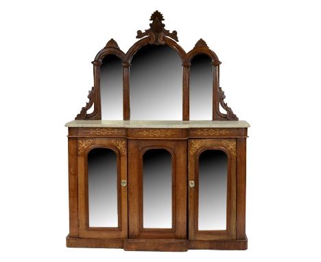 Victorian inlaid walnut chiffonier, arched mirror back with carved pediment, breakfront marble top, the base with mirrored do