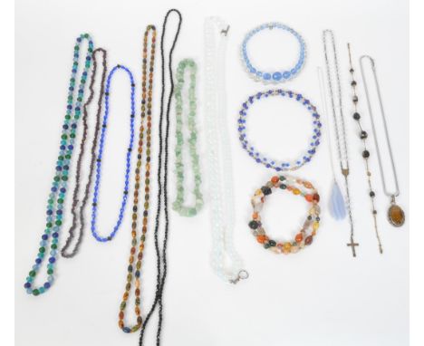 A collection of vintage beaded necklaces. The lot to include glass, French jet, ceramic, garnet, aventurine quartz, opaline g