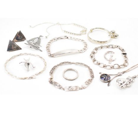 A collection of 925 silver jewellery. The lot to include; A flat curb link identity bracelet, extendable baby bangle with bel
