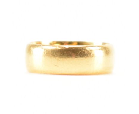 A hallmarked 22ct gold wide band ring. The ring band approx 6mm. Hallmarked Birmingham. Weight 5.4g. Size K.&nbsp;