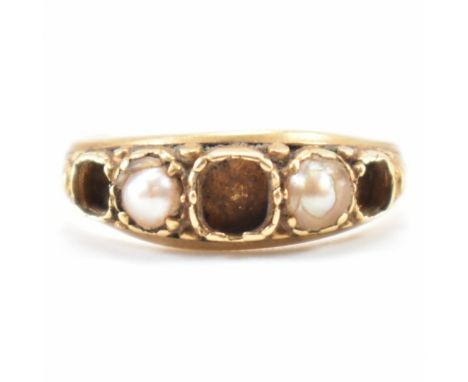 An antique gold and pearl ring. The ring being set with two half pearls (three missing) and further prill detailing. Unmarked