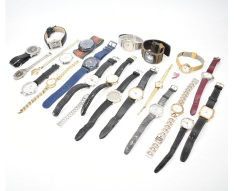 A collection of vintage wrist watches. The lot to include Swatch, Mirexal, EverSwiss, Paul Jardin, Nixon, M Watch, Eterna Mat