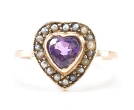 A 1930's&nbsp; 9ct rose gold amethyst &amp; seed pearl heart halo ring. The ring having having a central heart cut bezel set 