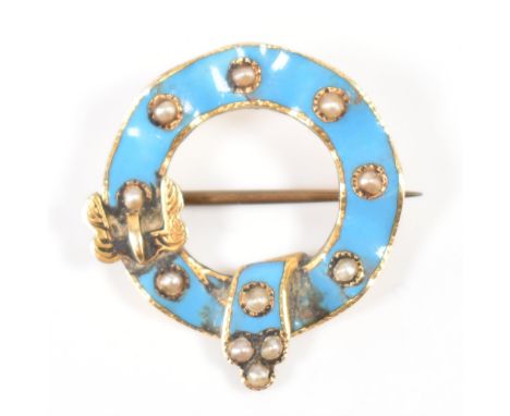 A 19th Century Victorian gold and enamel belt brooch. The brooch of round with with buckle and seed pearls. Unmarked, surface