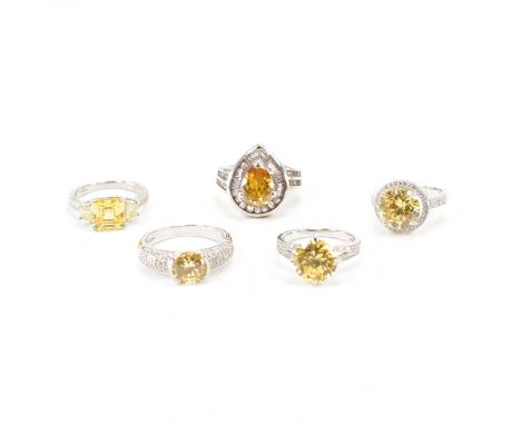 A collection of 925 silver and gemstone set dress rings. The rings set with yellow&nbsp; and white CZ .&nbsp; All&nbsp; beari