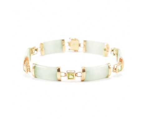 A Chinese gold jade and peridot bracelet. The bracelet having gold banded jade and peridot links to box clasp with Chinese sy
