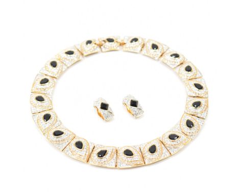 A vintage Vendome Demi Parure necklace and earrings suite. The necklace constructed from square panels with pearl cut black s