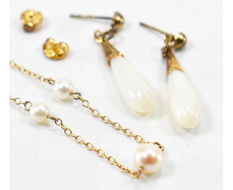 A hallmarked 9ct gold and cultured pearl necklace together with a pair of mother of pearl drop earrings. The necklace having 