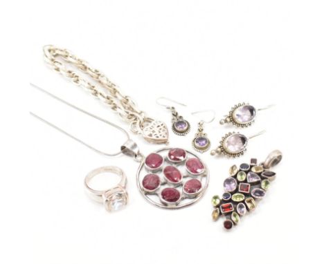 A collection of assorted silver jewellery. The lot to include a silver and ruby pendant necklace with snake chain, a pair of 