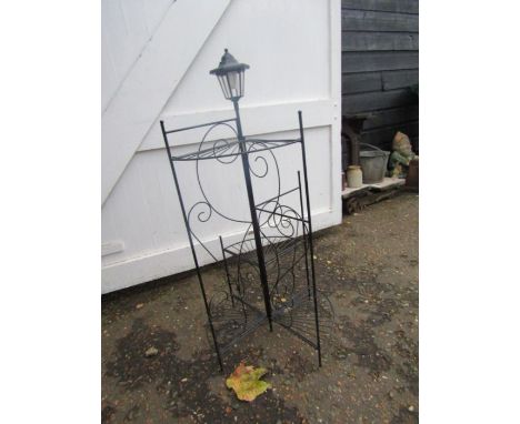 A plant stand with solar light