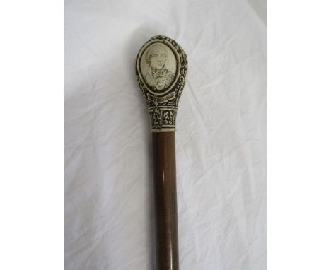 A naval stick with Nelson, HMS Victory ship and alms carvings