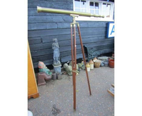 A&nbsp; brass telescope on extending tripod