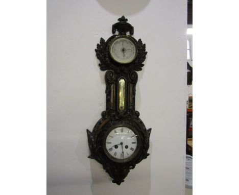 A metal cased barometer