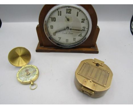 A retro smiths clock and 2 brass compasses