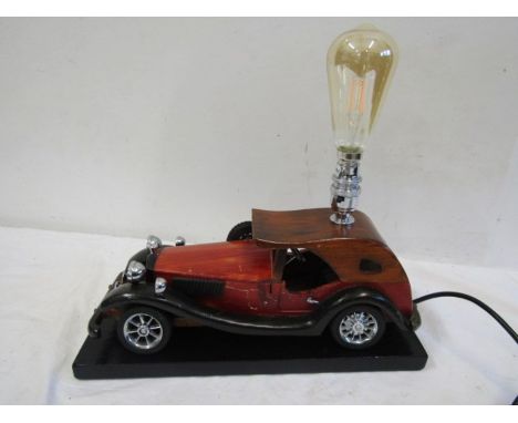 A vintage toy car lamp, hand made by a local gent