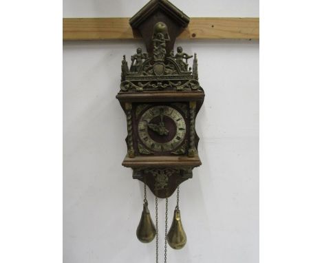 A Dutch wall clock with brass pear weights and brass detail