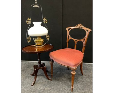 A late Victorian carved walnut hall chair; late 19th/ early 20th century hanging oil lantern (converted for use with electric