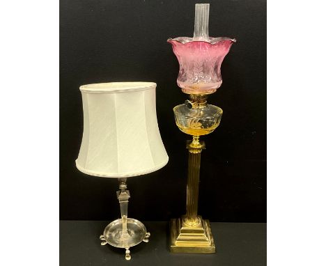 A early 20th century brass Corinthian columned oil lamp, pink shade, 85cm high; other (2)