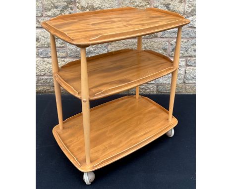 An Ercol Windsor light elm three-tier trolley, 77cm high x 72cm wide x 46cm deep.