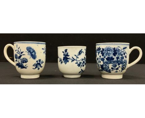 Three early Worcester coffee cans - including fence pattern, c.1770, and first period Three Flowers pattern, and Mansfield pa