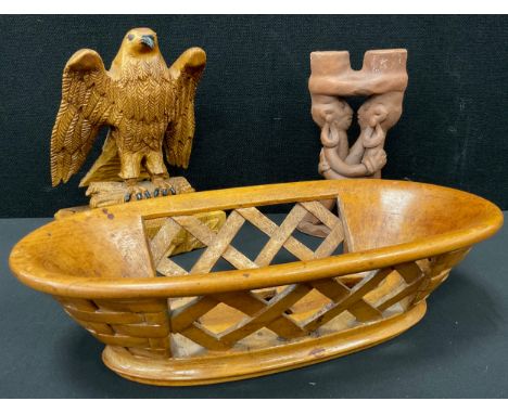 A Pitcairn Island style carved wooden bowl, basket-weave decoration, 30cm wide;  a carved oak eagle, wings half outstretched,