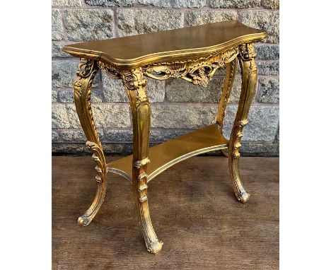 A Louis XVI revival giltwood effect hall table, the serpentine shaped top above a carved frieze, cabriole legs, and with a si