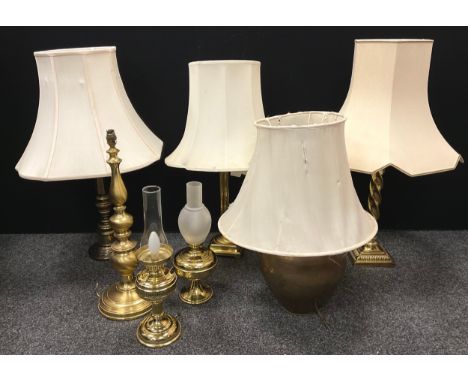 Brass candlestick including; twist columned lamp, 77cm high, corthian columned lamp, 67cm high, faceted column, 72cm high, gl