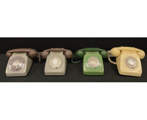 A Vintage rotary dial telephone, in green, c.1970, another two similar in dual colour grey and chocolate brown;  another in c