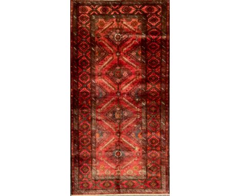 A North east Persian Meshed Belouch rug / carpet, 200cm x 105cm.