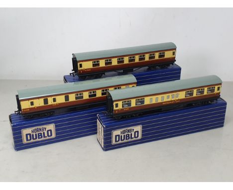 Two boxed Hornby Dublo D21 1/2nd and Brake/2nd Coaches and a boxed D20 Restaurant Car, all M, all with metal wheels, boxes ge