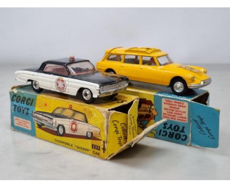 A boxed Corgi Toys No.436 Citroen Safari and a No.237 Oldsmobile 'Sheriff' Car, both G-VG, boxes P-F