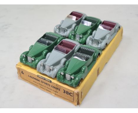 A Dinky Toys Trade Box full of 38C Lagonda Sports Coupes, three green and three grey, Nr M-M, with dividers