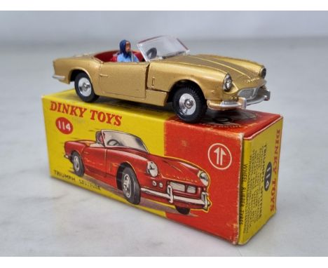 A boxed Dinky Toys No.114 gold Triumph Spitfire with Tiger transfer, Nr M-M, box Ex