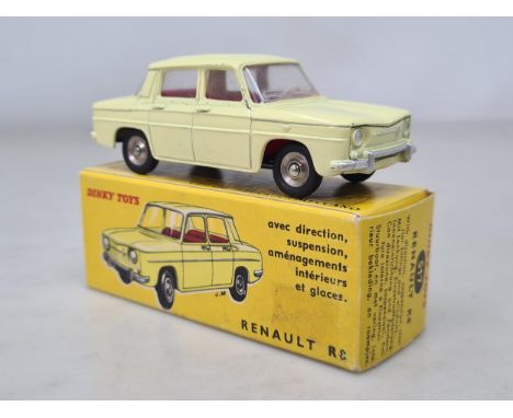A boxed French Dinky Toys No.517 pale yellow Renault R8, Nr M-M, box superb