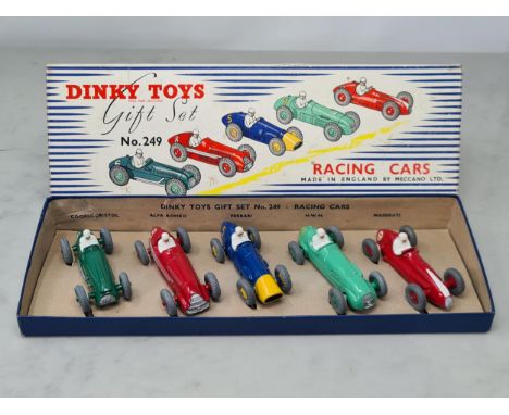 A boxed Dinky Toys No.249 Racing Car Gift Set, all cars with the later three digit number, M, base card perfect with rare top