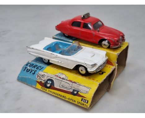 A boxed Corgi Toys No.213 2.4 Jaguar Fire Service Car and and No.215 Ford Thunderbird Open Sports, both F-G, boxed P