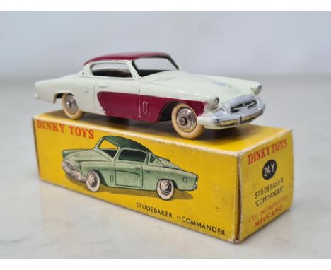 A rare boxed French Dinky Toys No.24Y ivory and maroon Studebaker Commander, Nr M-M, box Ex