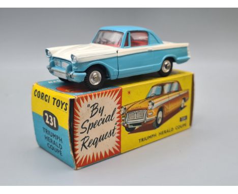 A boxed Corgi Toys No.231 blue and white Triumph Herald, M, box Ex plus