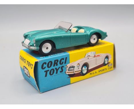 A boxed Corgi Toys No.302 metallic green M.G.A. Sports Car, M, box superb