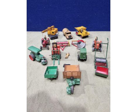 A collection of play worn Dinky Toys including Refuse Truck, Roller, Dump Truck, Massey-Harris Tractor, Fork Lift, Lawn Mower