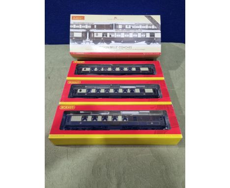 A Hornby (China) R4251 'Devon Belle' Coach Pack containing three Super Detail Pullman Coaches with lights including 1st Class