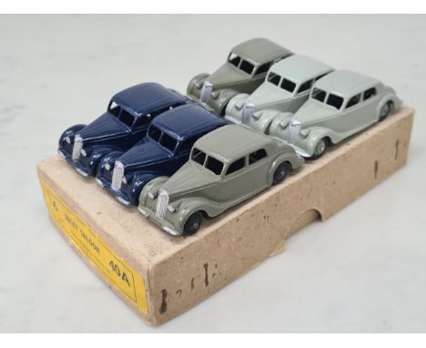 A Dinky Toys full Trade Box of No.40A Riley Saloons, two grey, two blue and two dark grey, Nr M-M, box Ex plus without divide