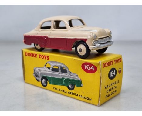 A boxed Dinky Toys No.164 maroon and cream Vauxhall Cresta Saloon, M, box superb