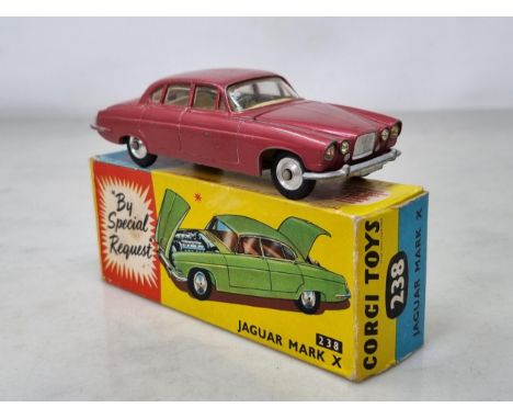 A boxed Corgi Toys No.238 red Jaguar Mk.10, lacking luggage in boot, G, box Ex