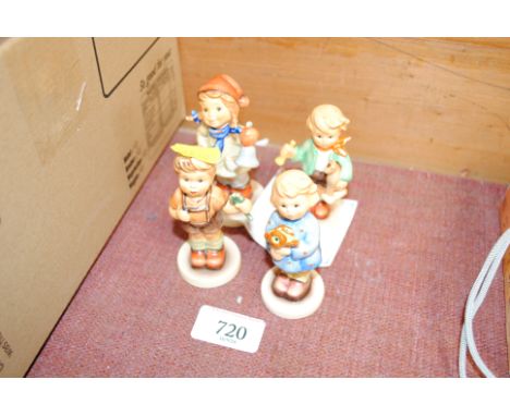 Four Goebel figures